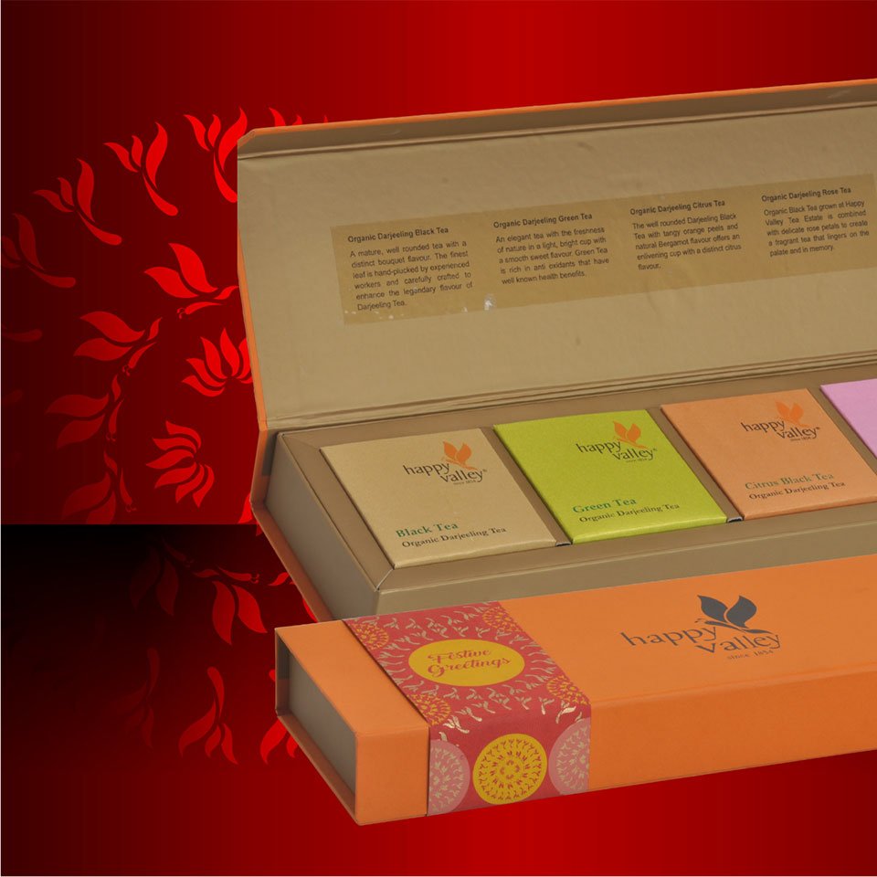 https://old.wysiwyg.co.in/sites/default/files/worksThumb/Ambootia-happy-valley-tea-packaging-box-festive-durga-puja-2017.jpg
